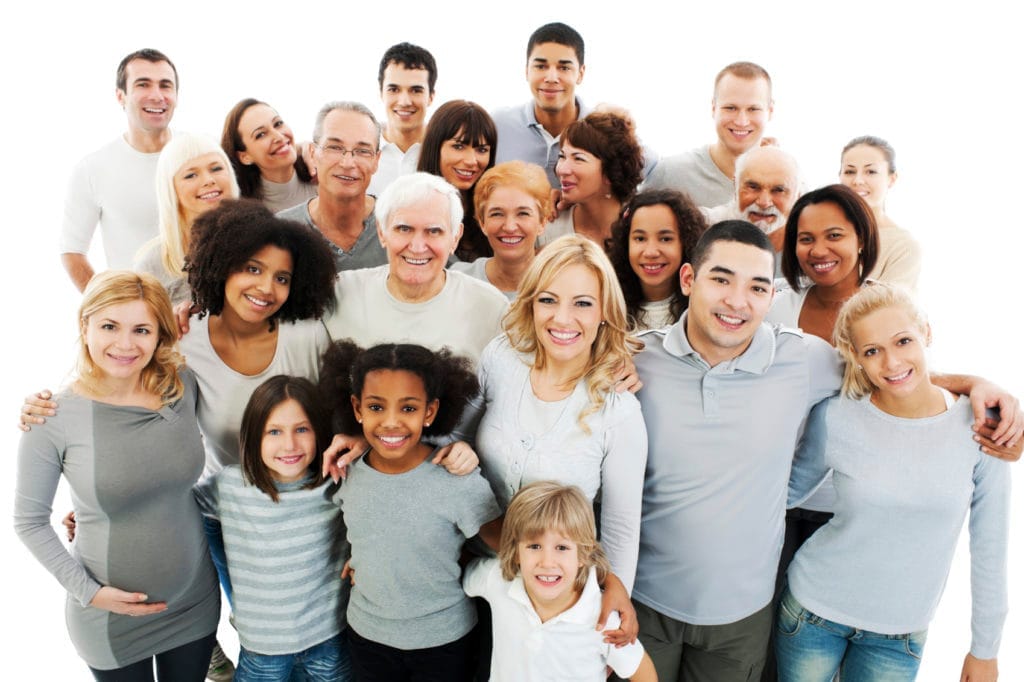 Photograph of smiling patients in a dental clinic.