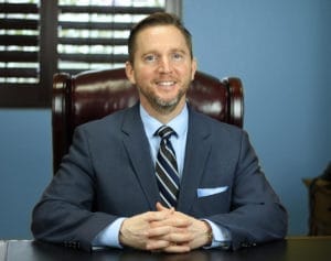 Professional portrait of Mike Menkhaus.