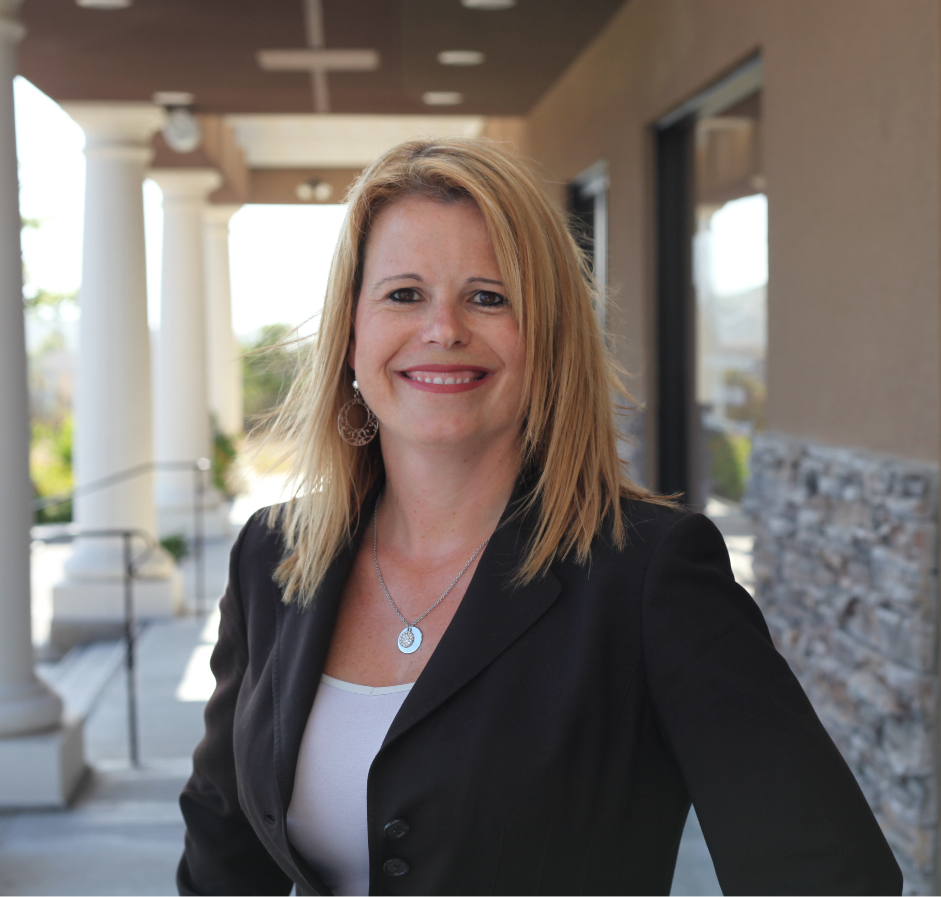 Professional portrait of Laura Hatch.