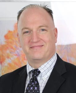 Portrait of John Austin, dental consultant.