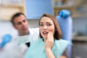 Patients seeking emergency dental care in a clinic.