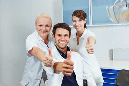 Headshot of Jan Levin, a professional in business attire smiling at the camera.