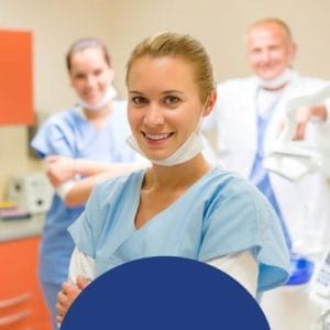 Dental assistant providing patient care.