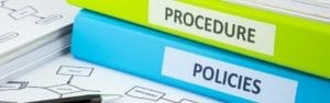 Graphic representing a policy and procedure manual.