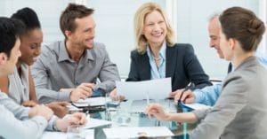 Dental team collaborating in a modern office environment.
