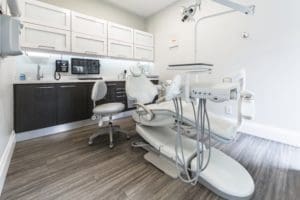 A dentist’s chair in an examination room.