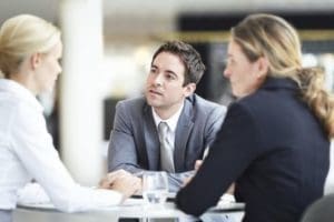 Illustration of an employer firing an employee.