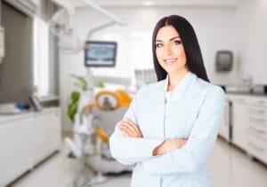 Team of dental professionals working collaboratively in a modern office.