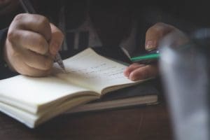 A group of professionals discussing in a modern office environment.