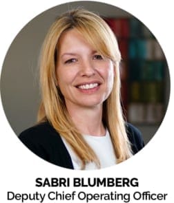 Portrait of Sabri Blumberg, Deputy Chief Operating Officer at MGE