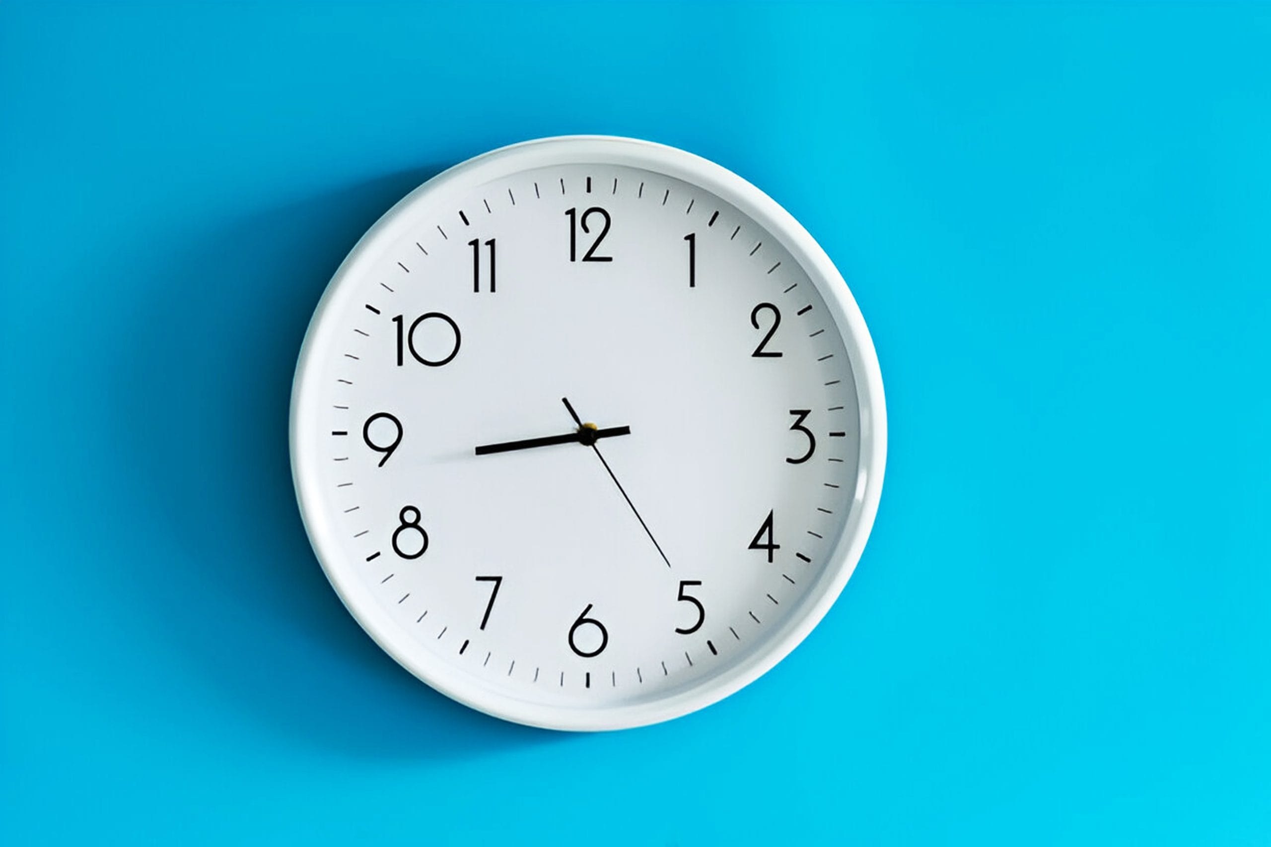 A wall-mounted analog clock.