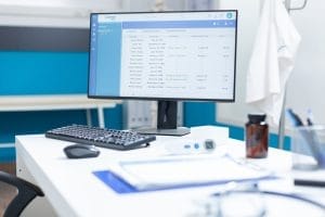 Dental team reviewing patient schedules.