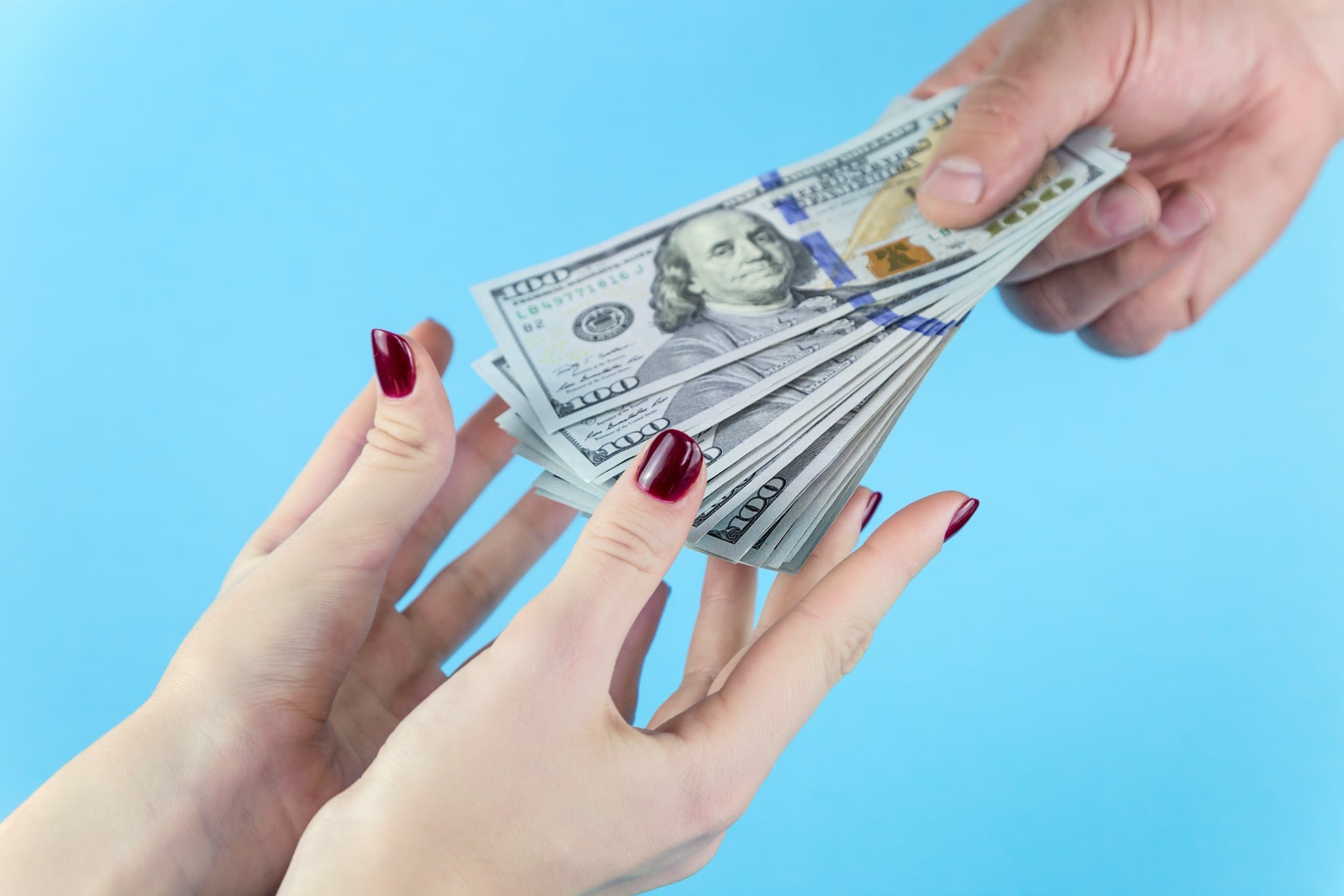 A human hand extended in a helping gesture.